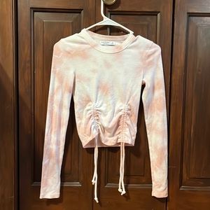 pink and white tie dye crop top.